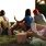 People enjoying an outdoor movie